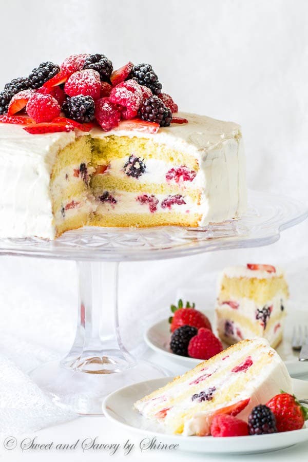 Truly easy and perfect make-ahead cake for all occasions! Light and delicate sponge cake layers loaded with fluffy Chantilly cream frosting and fresh berries.