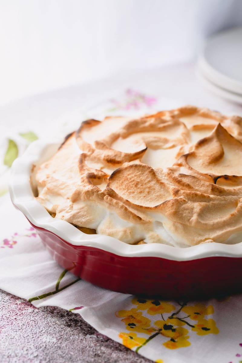 Classic lemon meringue pie recipe with lots of tips and tricks for a perfect pie every time! No more weeping and shrinking. This's the BEST! #lemonmeringuepie