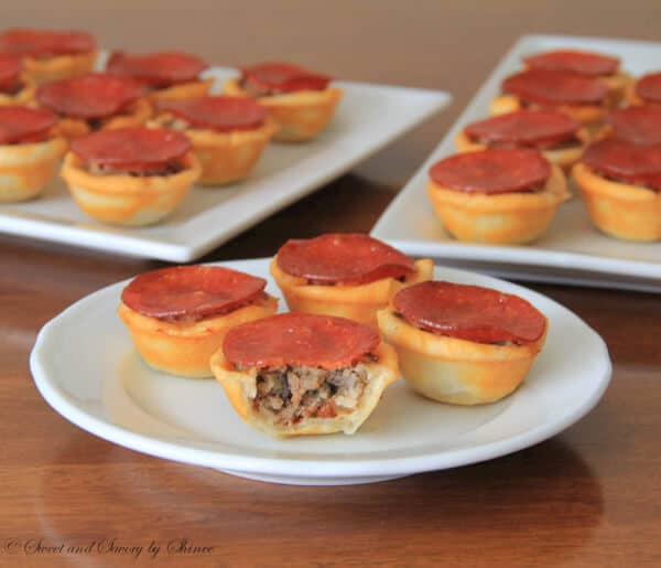 Simple mini pizza tartlets. Perfect appetizer for meat-lovers!