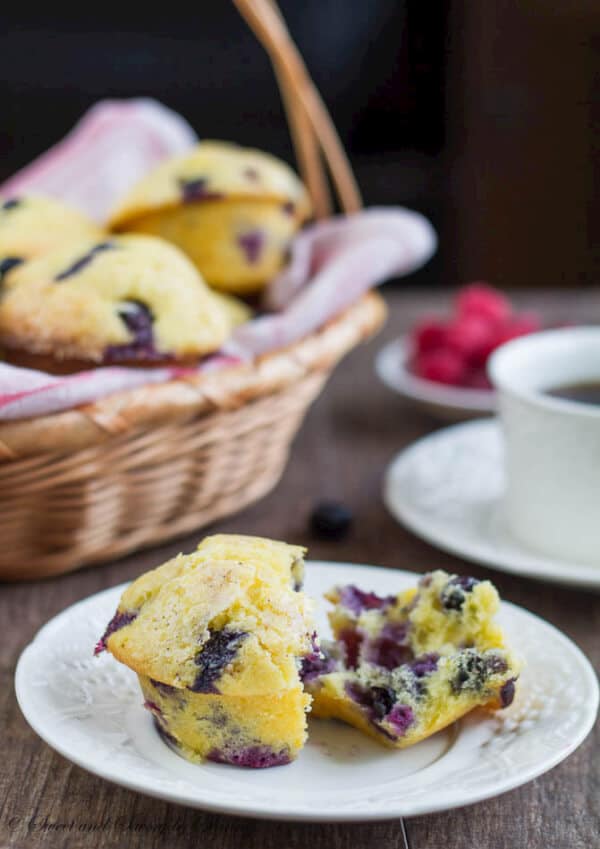 These tall blueberry cheesecake muffins are melt-in-your-mouth-fluffy and loaded with fresh blueberries! Not your usual blueberry muffins here, you've got to try this!
