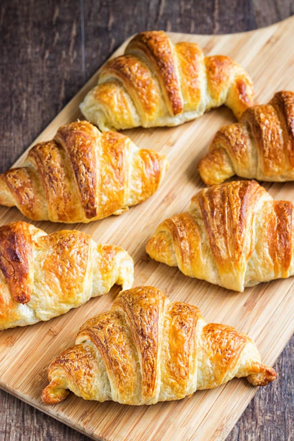 Buttery homemade croissants aren't as hard as you may thing. Yes, it takes a little bit of elbow grease, but nothing you can't do. And the result is so worth it!