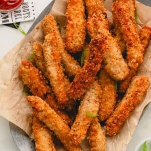 A basket of fried pork srtrips.
