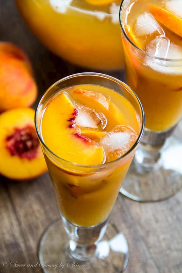A tall glass of ice-cold peach iced tea is just what you need to quench your thirst on a hot day. Honey sweetened peachy iced tea perfection!
