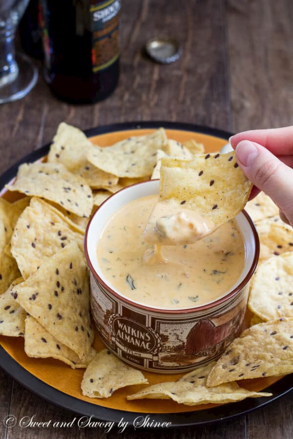 Lusciously creamy and smooth, this hot cheese dip recipe is the easiest thing you'll make for your game day party! Irresistibly cheesy and velvety smooth cheese dip, just the way you like it.