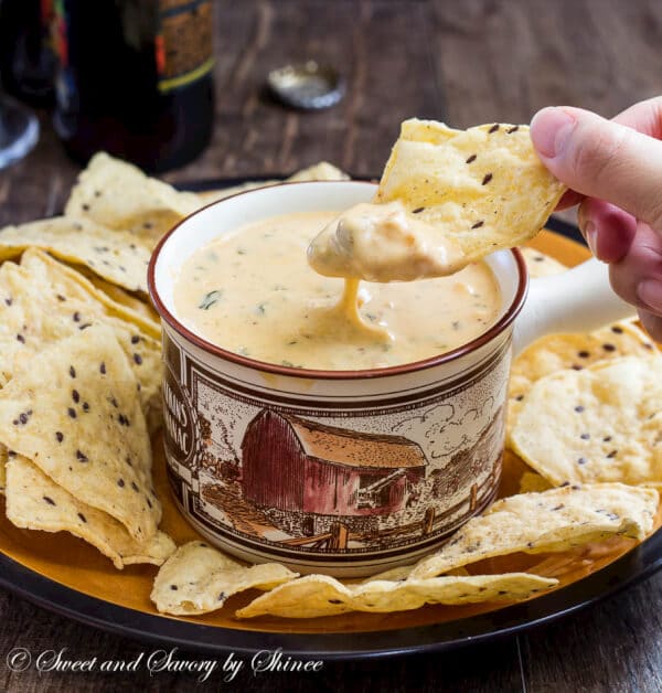 Lusciously creamy and smooth, this hot cheese dip recipe is the easiest thing you'll make for your game day party! Irresistibly cheesy and velvety smooth cheese dip, just the way you like it.