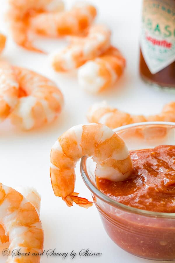 My tips and tricks on poaching the shrimp for classic shrimp cocktail made completely from scratch. Almost as easy as buying a ready tray, but much more flavorful, juicy and delicious! 