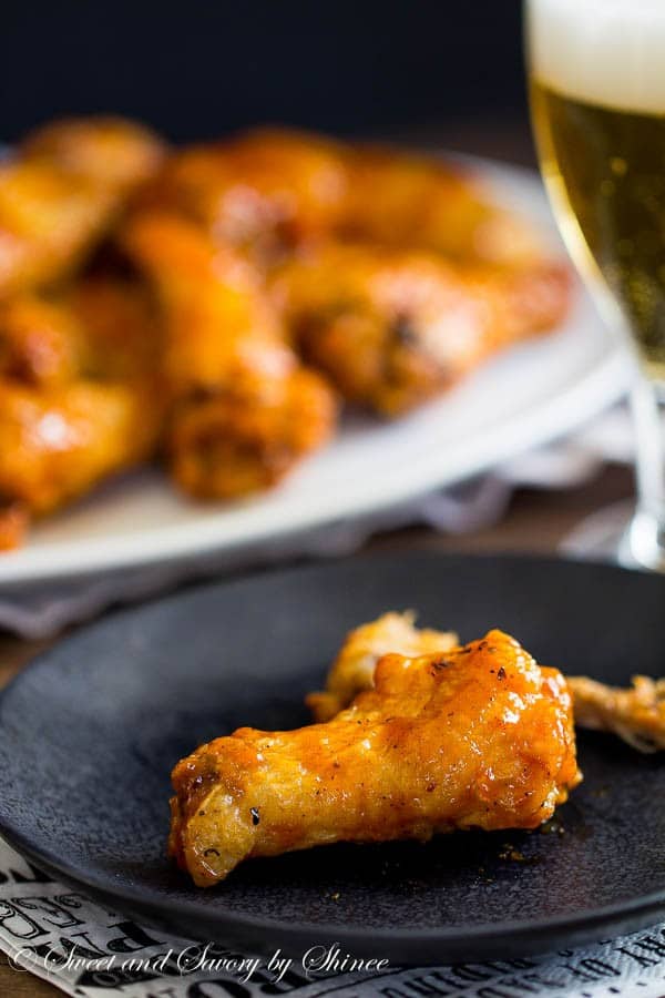 Sticky, messy, and absolutely irresistible, these Jamaican jerk chicken wings are baked to crisp perfection and tossed in your favorite jerk sauce.