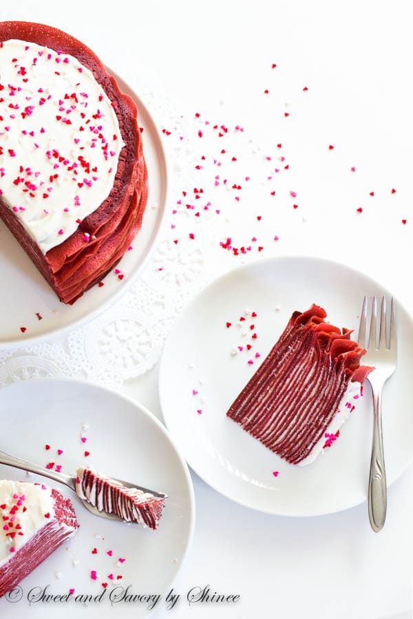 Made with layers of thin red velvet crepes and filled with tangy cream cheese filling, this crepe cake tastes as delicious as it looks! Perfect dessert for Valentine’s Day.