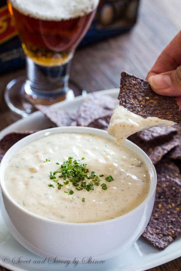 This super easy beer cheese dip from scratch is full of flavor and comes together in less than 20 minutes. Every party should have this dip!
