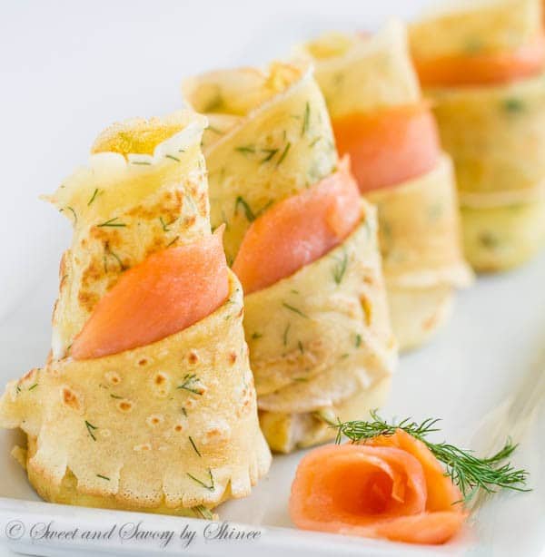 Delicate, thin dill crepes with smoked salmon make absolutely impressive, irresistibly delicious appetizer to jazz up your cocktail party!
