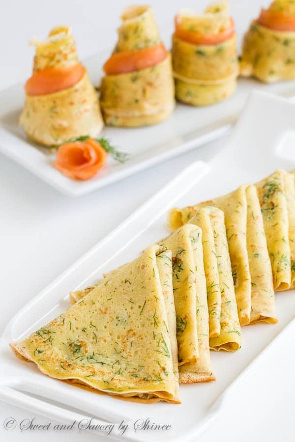 Delicate, thin dill crepes with smoked salmon make absolutely impressive, irresistibly delicious appetizer to jazz up your cocktail party!