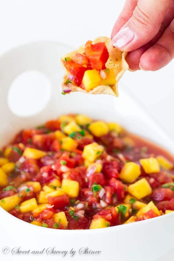 Bursting with delicious summer flavors, this mango salsa comes together in less than 10 minutes with only handful of ingredients!