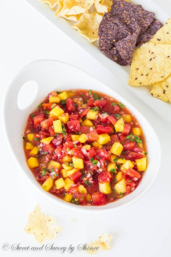 Bursting with delicious summer flavors, this mango salsa comes together in less than 10 minutes with only handful of ingredients!