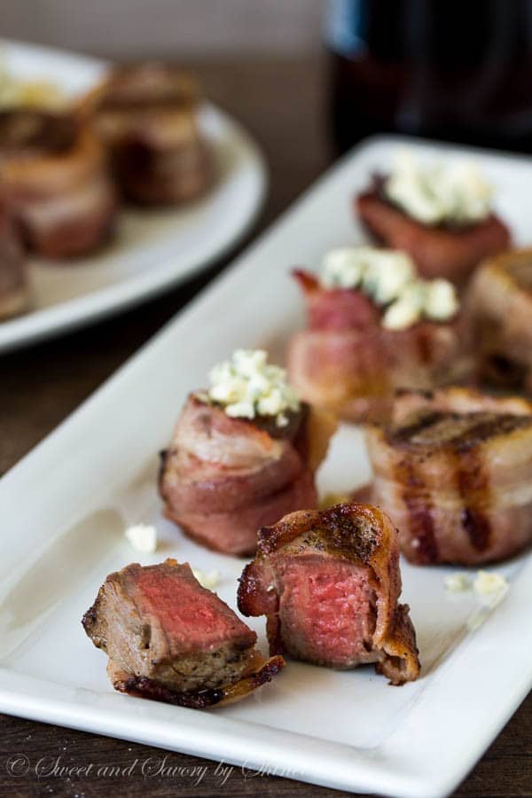 Wrapped in bacon and topped with blue cheese, these melt-in-your-mouth tender mini filet mignons are simply the best!!