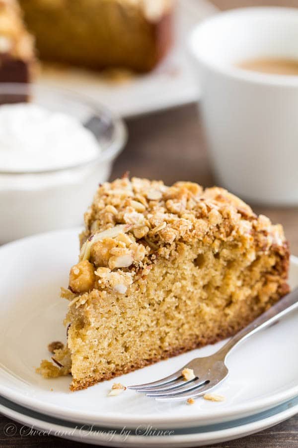 Tall and tender, this spiced pear coffee cake topped with nutty, crunchy crumb topping is a delicious start to fall baking!