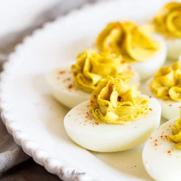 A hint of curry and hot sauce gives an unusual twist to these otherwise classic deviled eggs.