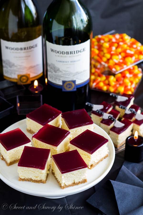 Thick, creamy cheesecake squares topped with a layer of tangy wine gelée. Irresistibly rich and perfect make-ahead dessert!