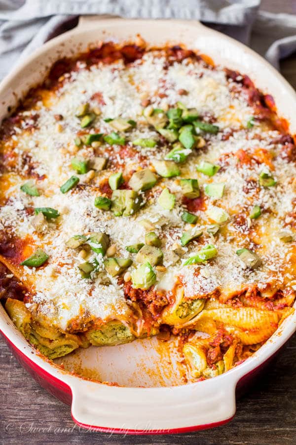 Filled with pesto ricotta filling, these jumbo stuffed shells are simmered in rich Ragu sauce and topped with crispy Panko and creamy avocado. Lots of flavor and lots of texture! A delicious way to bring your family together at the dinner table.