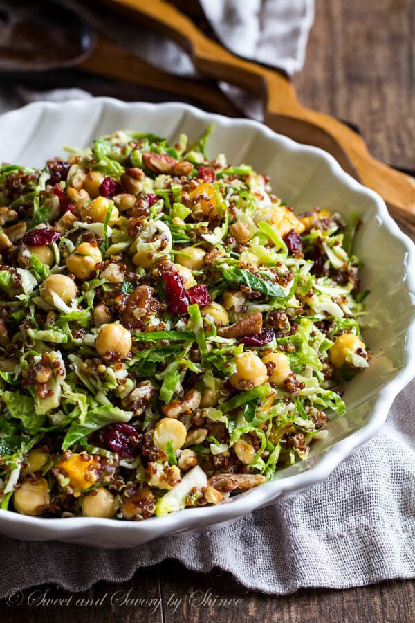Lots of texture and lots of flavor in this festive quinoa brussels sprouts salad. Who said salad can't be the center of attention at Thanksgiving dinner?