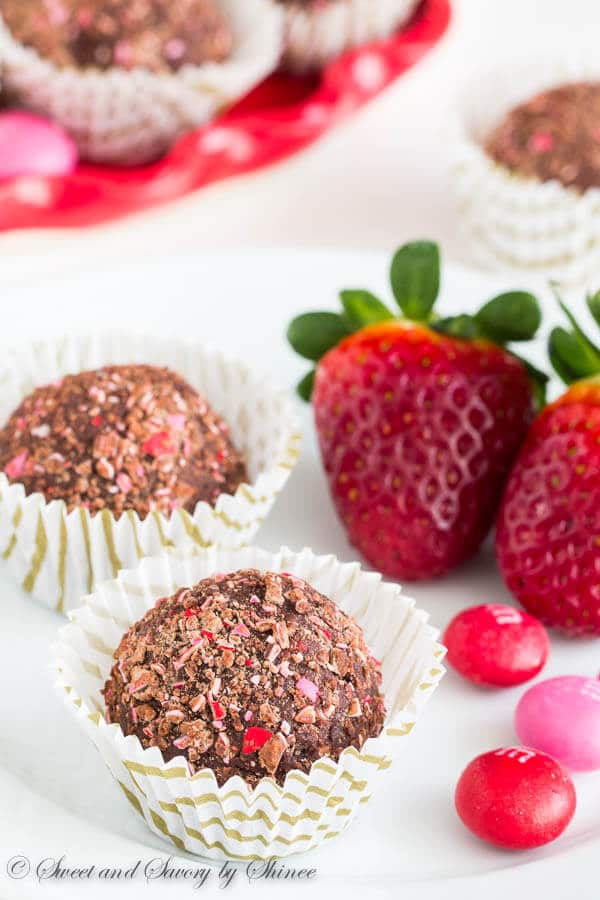 Strawberry Chocolate Truffles- Silky smooth, irresistibly rich and creamy, these Strawberry M&M's® crusted chocolate truffles are unbelievably easy to make.