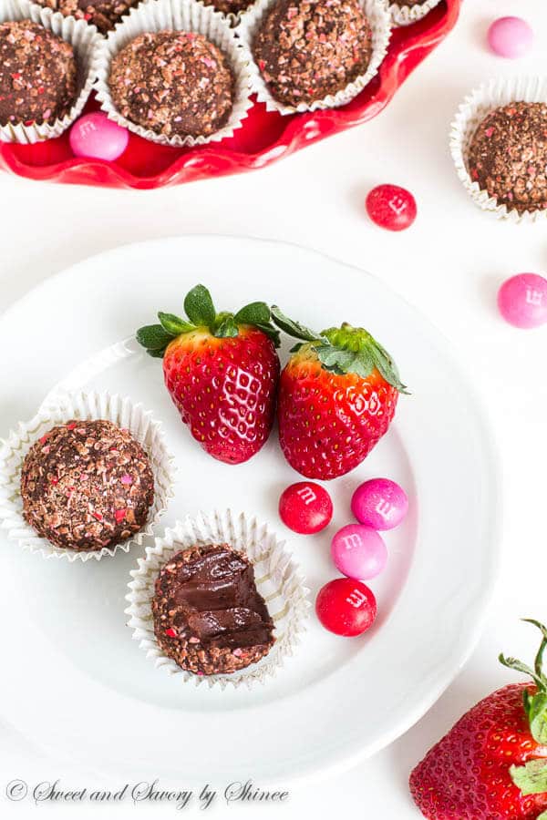 Strawberry Chocolate Truffles- Silky smooth, irresistibly rich and creamy, these Strawberry M&M's® crusted chocolate truffles are unbelievably easy to make.