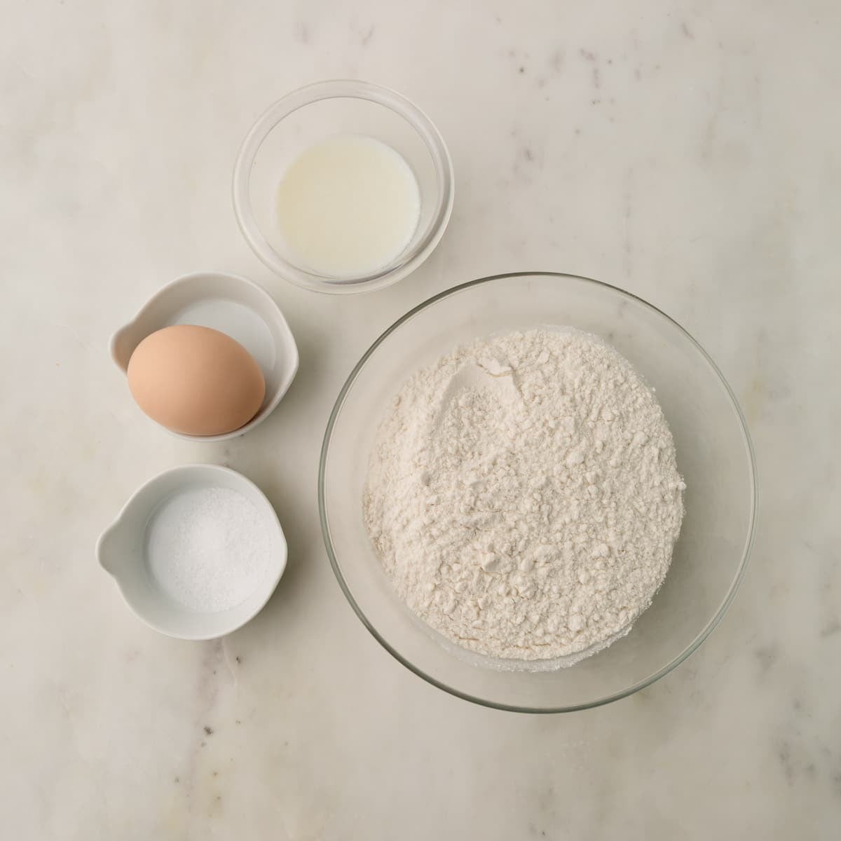 Ingredients for knoephla in individual bowls.