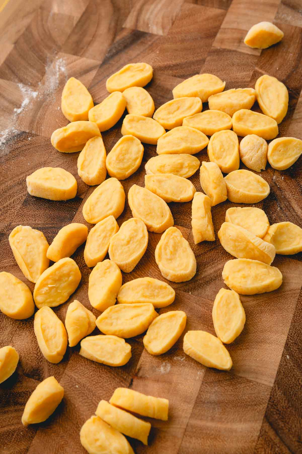 Raw knoephla dough cut into bite-sized pieces.