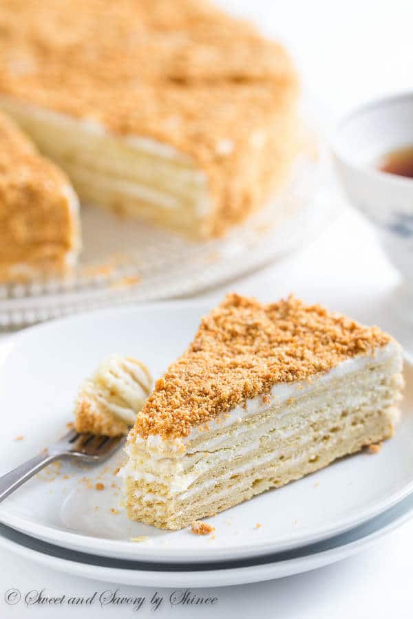 Buttery, flaky pastry layers generously filled with sweet cream filling...This Russian cake "Napoleon" is the sweetest taste from my childhood.