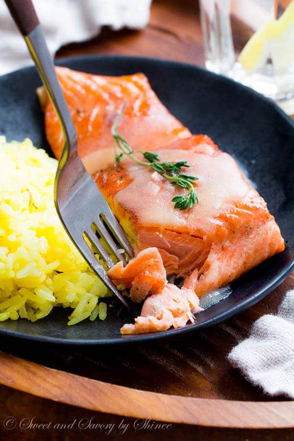 Beautiful pan fried steelhead trout with crispy skin and juicy tender meat, smothered with tangy thyme lemon butter sauce. Delicious dinner in minutes!