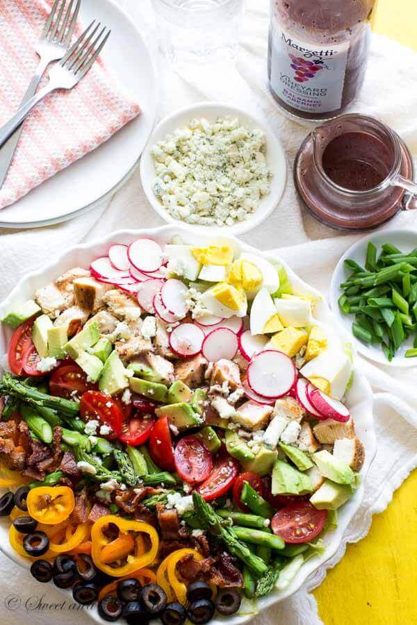 This spring version of classic cobb salad is bursting with tons of spring flavors and loaded with texture. Tangy Marzetti® Vineyard Dressing in Balsamic Cabernet dressing ties everything together so you can enjoy the most satisfying salad ever!
