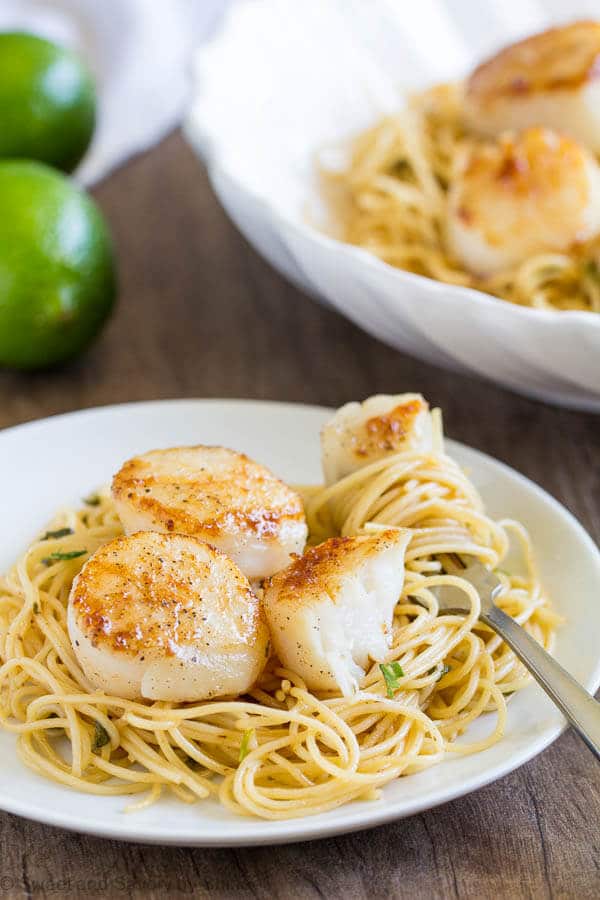 Zesty, buttery tequila lime pasta with seared scallops is a quick and easy dinner for weeknights and beyond. Perfectly seared scallops are easier than you may ever think!