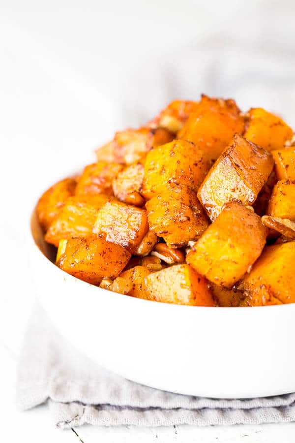 Irresistibly buttery and sweet, this roasted butternut squash with cinnamon feeds a crowd, which makes it perfect addition to your holiday menu!