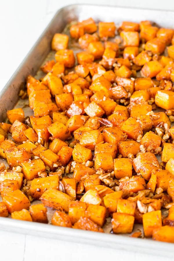 Irresistibly buttery and sweet, this roasted butternut squash with cinnamon feeds a crowd, which makes it perfect addition to your holiday menu!