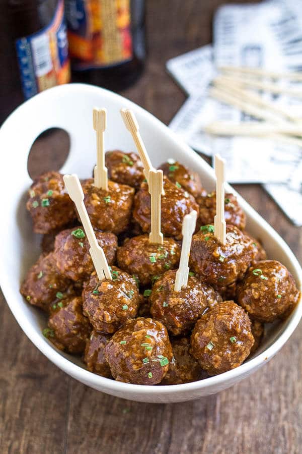 Ditch that grape jelly cocktail meatball recipe. And spoil your guests with these beer BBQ meatballs instead! Juicy tender meatballs in smoky, rich and slightly sweet beer bbq sauce. The BEST!