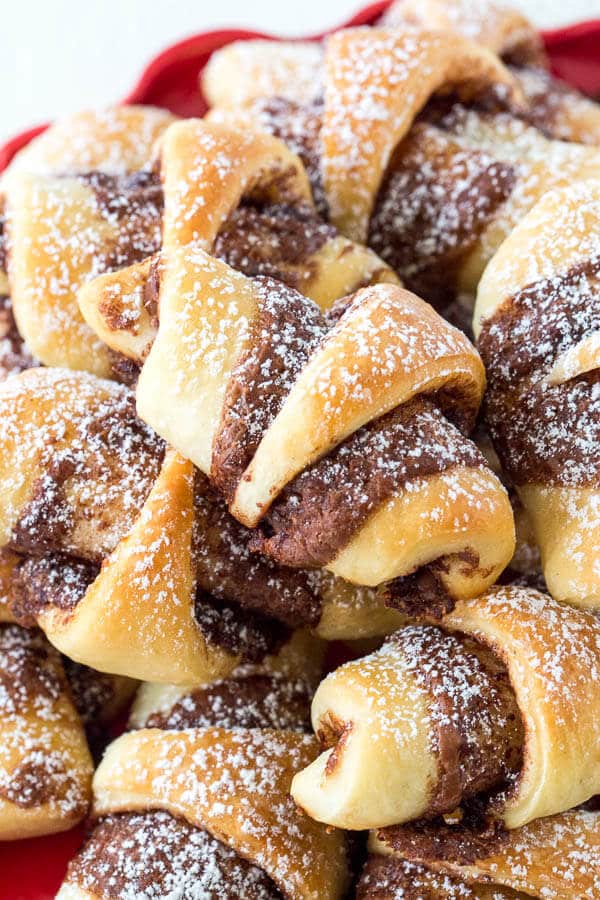 Soft and fluffy mom's old-fashioned rugelach are always a hit! These yeast leavened rugelach are light and tasty, and you can fill them with anything your heart desires.