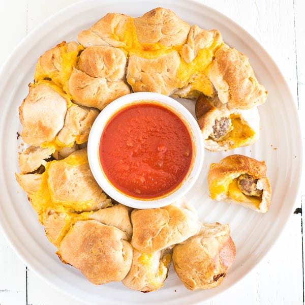 Seriously addicting meatball stuffed monkey bread - super easy finger food for a crowd. 