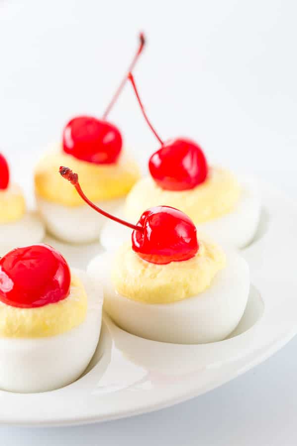 Surprise your guests with these insanely bizarre treats, that actually tastes sweet and tropical! These pina colada deviled eggs will be a HIT at any party!