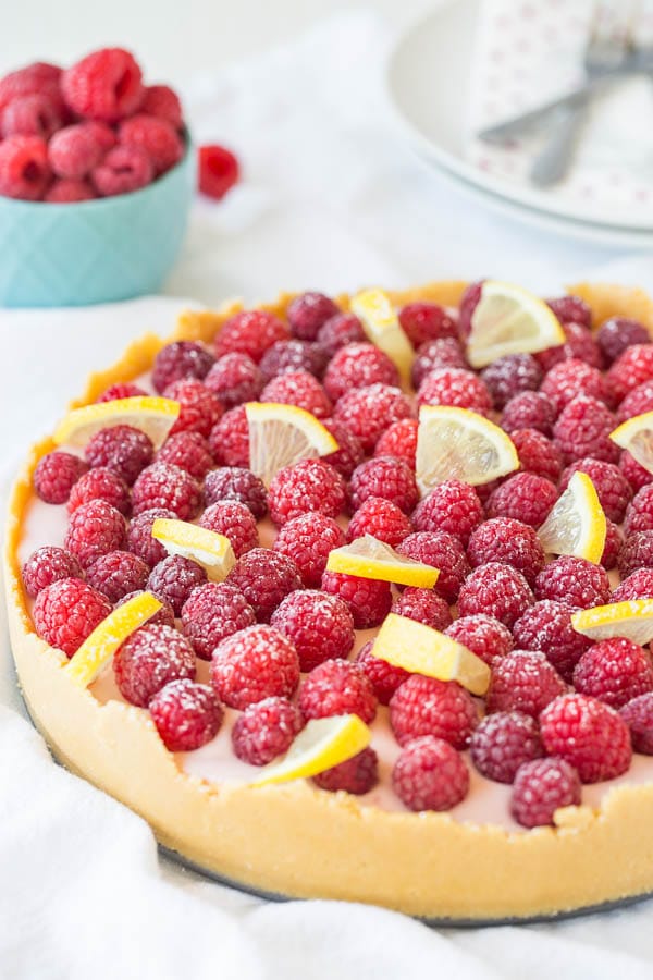 Creamy sweet and loaded with fresh berries, this lemon raspberry no bake cheesecake is a must-try summer treat. 