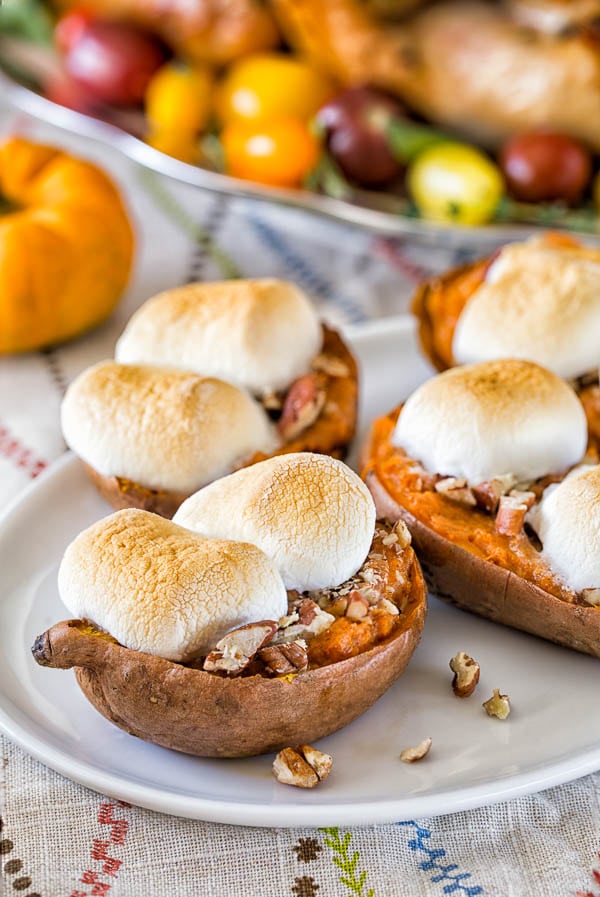 Toasted marshmallow twice baked sweet potatoes- it's like classic sweet potato casserole, but in an individual serving. The crispy marshmallows on top are everything! #sweetpotatoes #sweetpotatocasserole #Thanksgiving