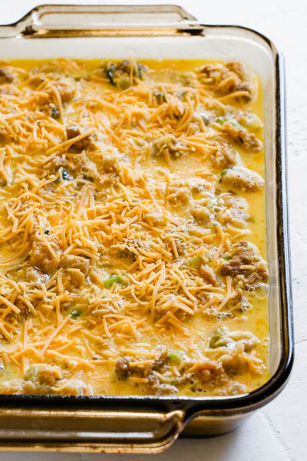 Unbaked cheesy breakfast casserole using leftover Thanksgiving sausage stuffing. #leftoverstuffing #ThanksgivingLeftoverRecipes #breakfastcasserole