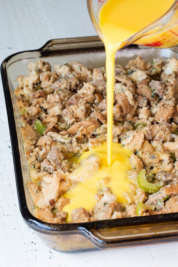 Leftover Thanksgiving sausage stuffing used in a easy make-ahead breakfast casserole. It feeds a crowd. #leftoverstuffing #ThanksgivingLeftoverRecipes #breakfastcasserole