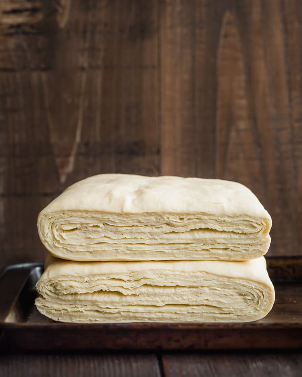Hundreds of layers in beautiful homemade croissant dough from scratch.
