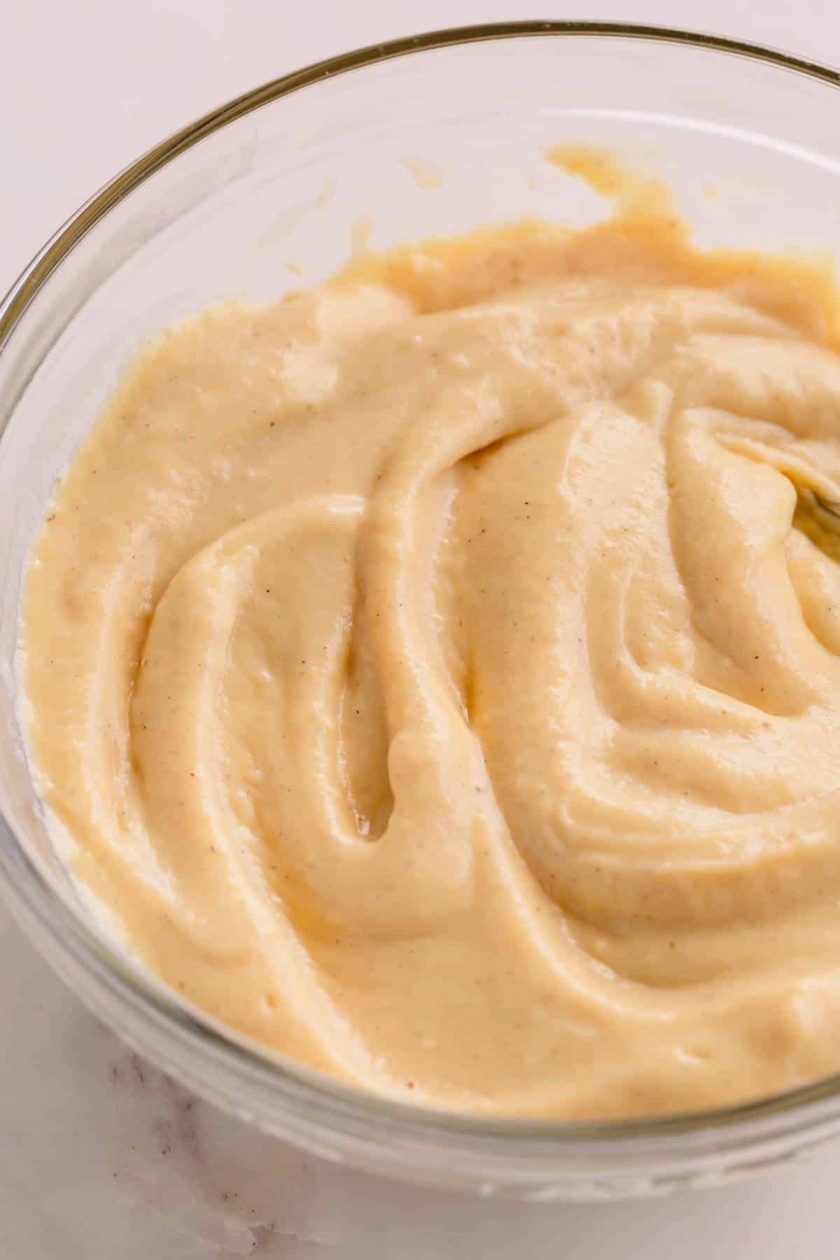 Homemade vanilla pudding in a bowl.