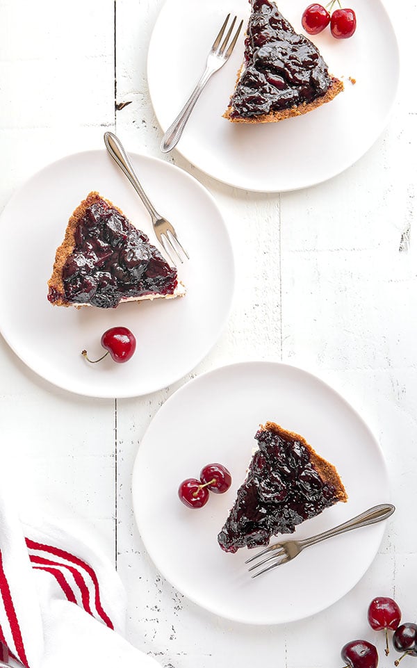 Nothing is better than a slice of creamy cheesecake, unless it's topped with delicious cherry pie filling. For the best flavor, make the cherry pie filling from scratch. It's incredibly easy!! #cherrycheesecakepie #cherrypiefilling #cheesecakepie #cherrycheesecake