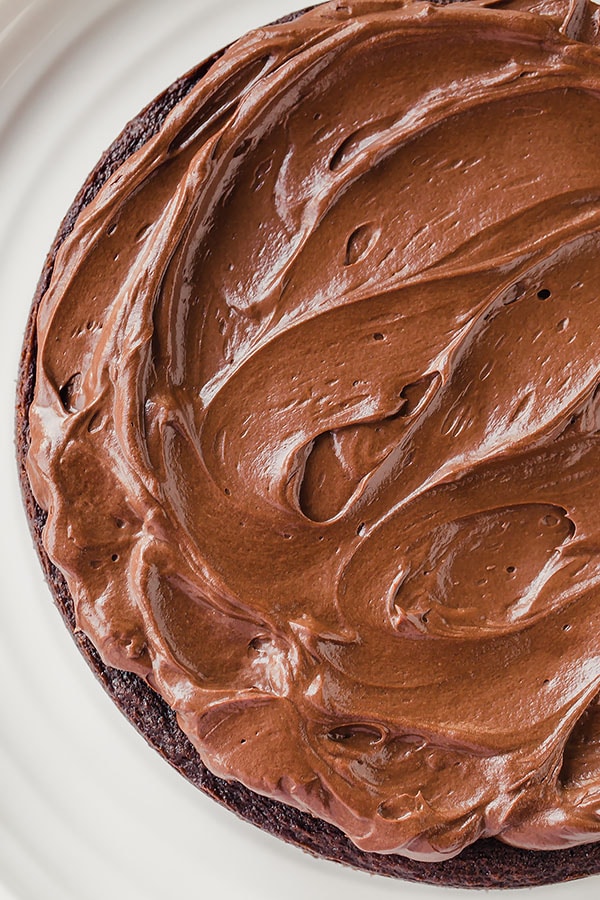 Detailed step by step directions to this rich and silky smooth mocha frosting. #mochafrosting #chocolatefrosting #chocolatecoffeefrosting #frosting