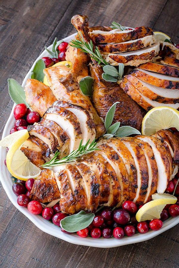 Love the zesty bright lemon flavors in every bite, along with aromatic herbs infused throughout the juicy meat.  If you love lemon, I know you'll love this turkey as well.  #ThanksgivingTurkey #turkey #thanksgivingrecipe #thanksgiving #wholeturkey