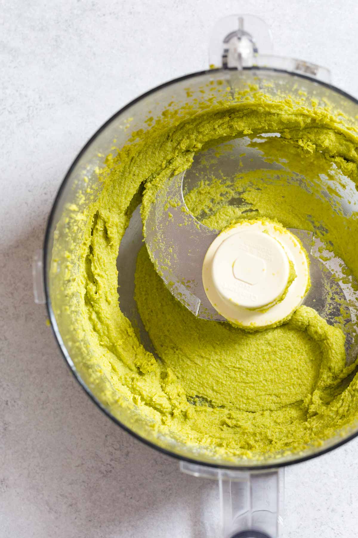 Smooth pistachio paste in a food processor.