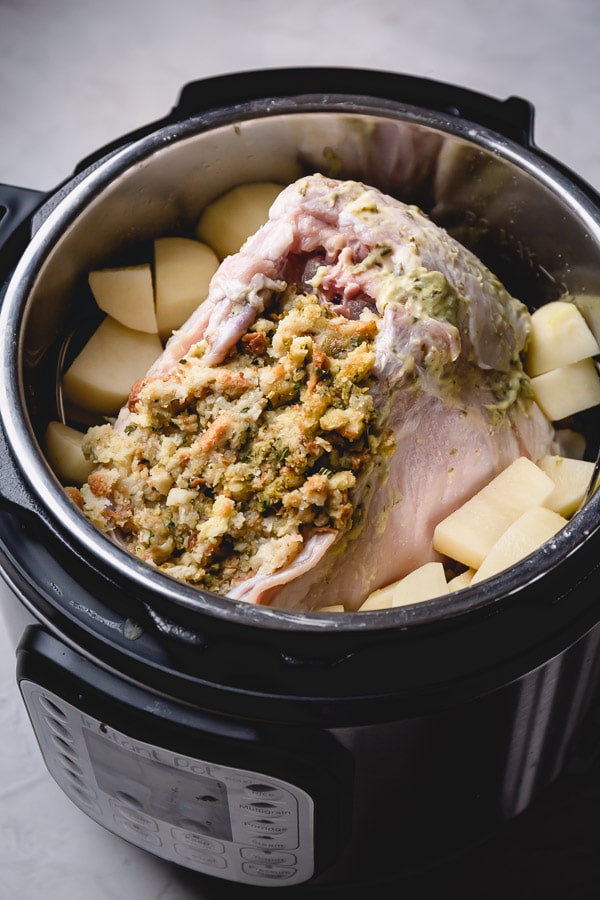 Ultimate Thanksgiving dinner on a small scale, cooked entirely in an Instant Pot in one go! Magic? Nah, just Instant Pot doing its thing!!! So this's what we have on our Thanksgiving menu: Thanksgiving turkey breast with stuffing and mashed potatoes. Plus, gravy!! #Instantpotturkeybreast #thanksgivingdinner #boneinturkeybreast