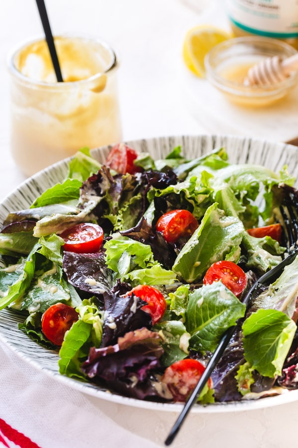 Delicious green salad with rich and creamy tahini dressing. #tahinidressing