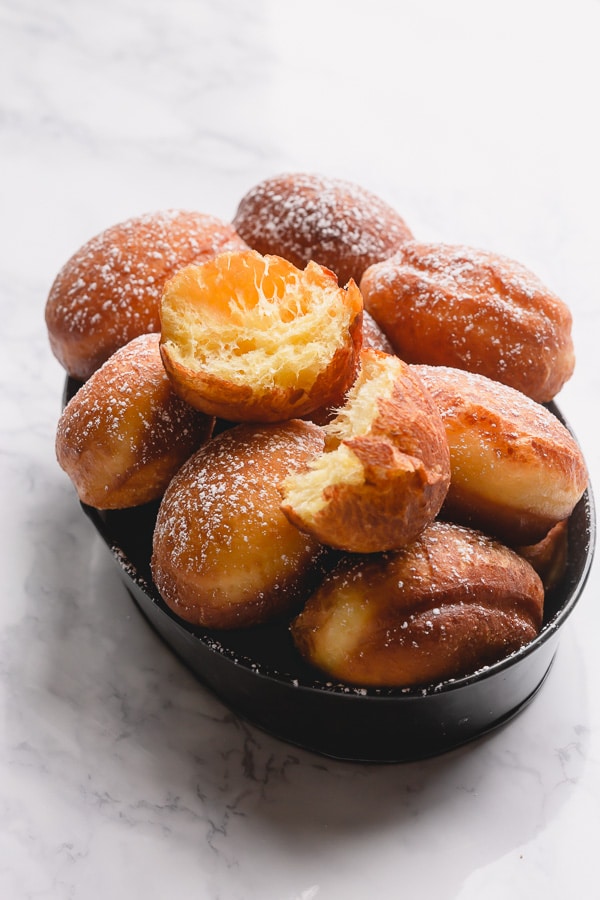 Light as air, these homemade jelly donuts, also known as Berliners, are pure magic! They're so fluffy, so light and not too sweet! Let me show how to make these treats, step by step.  #jellydonuts #donuts #bestdonuts #doughnuts